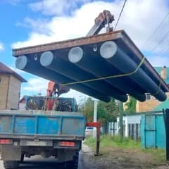 Погрузка понтона с трубными поплавками